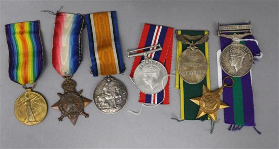 A World War II group of four medals to RJ Hill, Royal Signals a GSM with Palestine clasp 45-48,